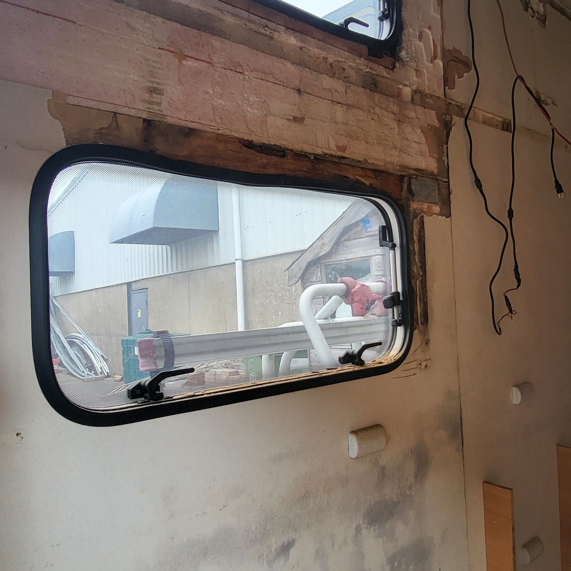 Damp above the window, stripped and rebuilt, Coachbuilt motorhome