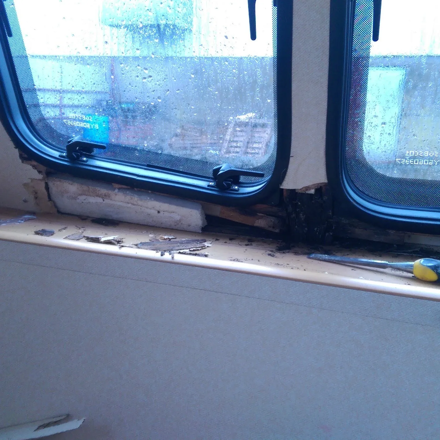 Water ingress under the nearside windows, before repair