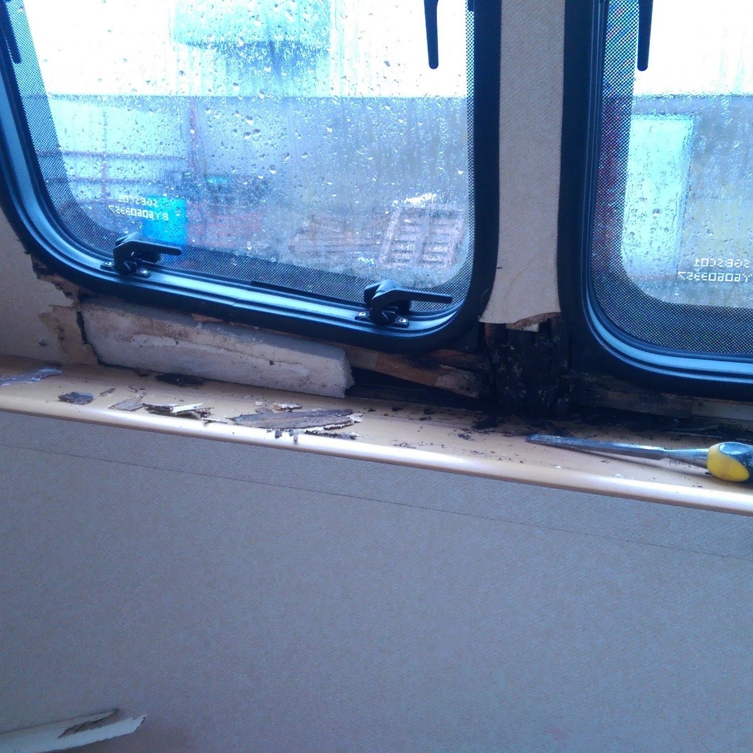 Water ingress under the nearside windows, before repair